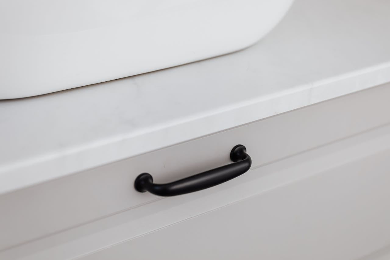 Black Horizontal Handle on a White Drawer